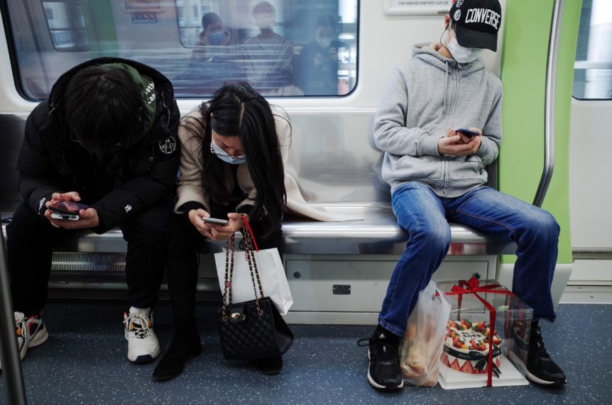 People on a train during the pandemic